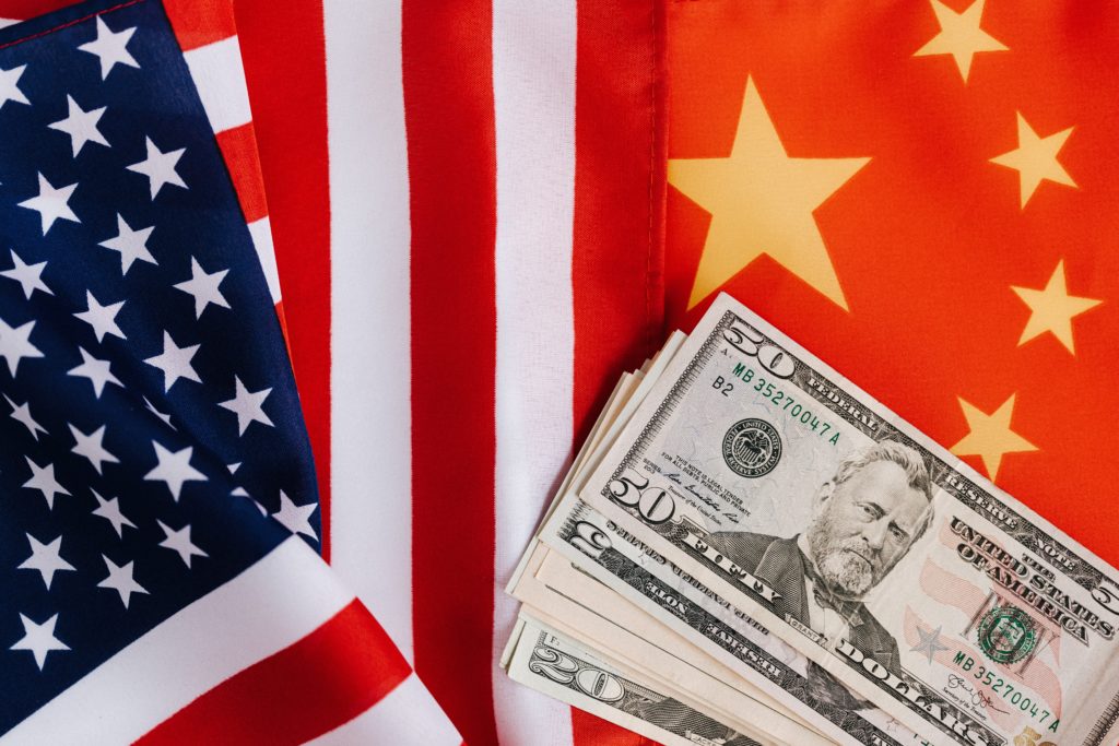 Photo by Karolina Grabowska: https://www.pexels.com/photo/american-and-chinese-flags-and-usa-dollars-4386371/