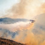 Photo by Frank Cone: https://www.pexels.com/photo/airplane-flying-over-burning-hilly-terrain-and-spreading-extinguishing-powder-9835606/