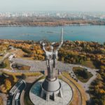 Photo by Petkevich Evgeniy: https://www.pexels.com/photo/aerial-view-of-motherland-monument-and-daniparo-river-in-kyiv-9955097/