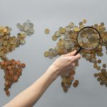 Photo by Monstera: https://www.pexels.com/photo/anonymous-person-magnifying-view-of-coins-shaped-in-world-map-7412098/