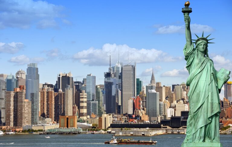 new-york-city-cityscape-skyline-with-statue-of-liberty-shutterstock_339298199-1