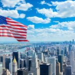 American-flag-over-a-cityscape-4K-Wallpaper-HD-620x349