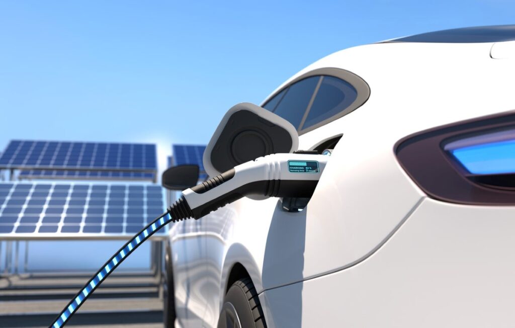 istock-1372085619-hidden-costs-of-owning-an-electric-car-vehicle-charging-by-solar-panels