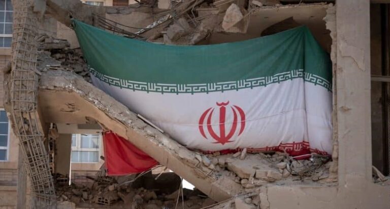 iran-flag-rubble-1-800x418