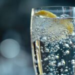 transparent-glass-with-sparkling-water-lemon-refreshing-drinks-summer_946657-24004